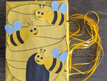 An Easy, DIY Beehive Pull String Piñata with Supplies from Home